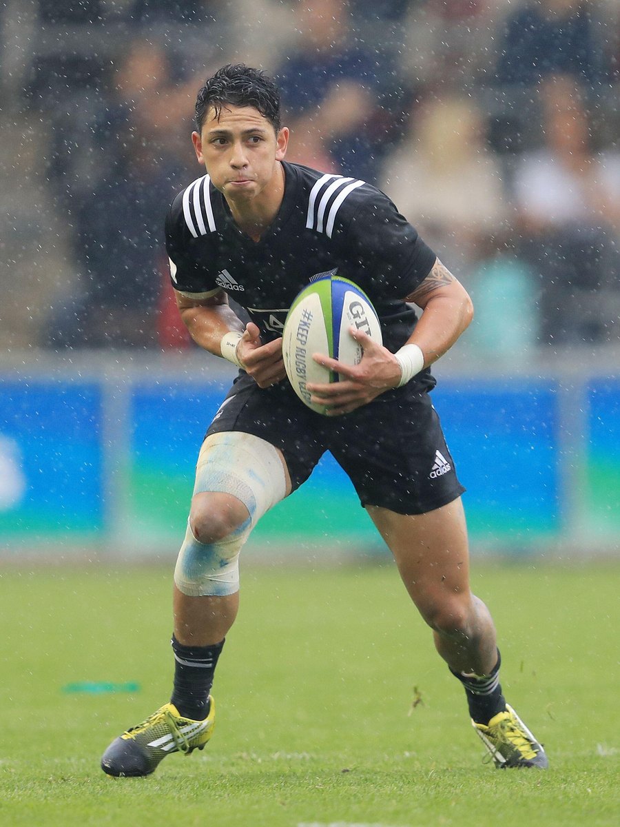 TJ Va'a playing for New Zealand Under 20, carrying the ball in wet conditions